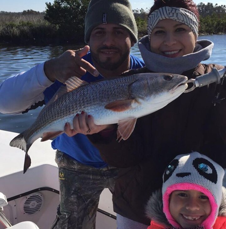 Fishing Charter Couple with Redfish